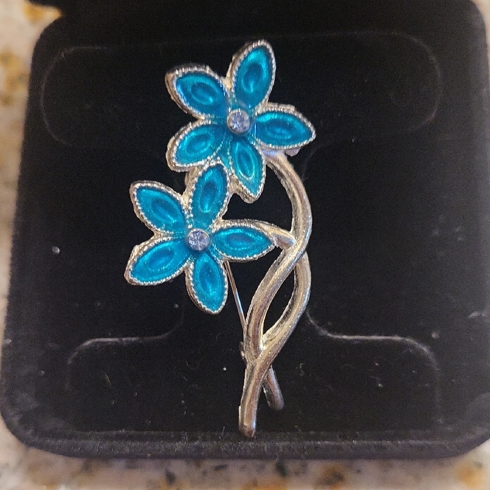 Elegant Silver and Blue Floral Brooch